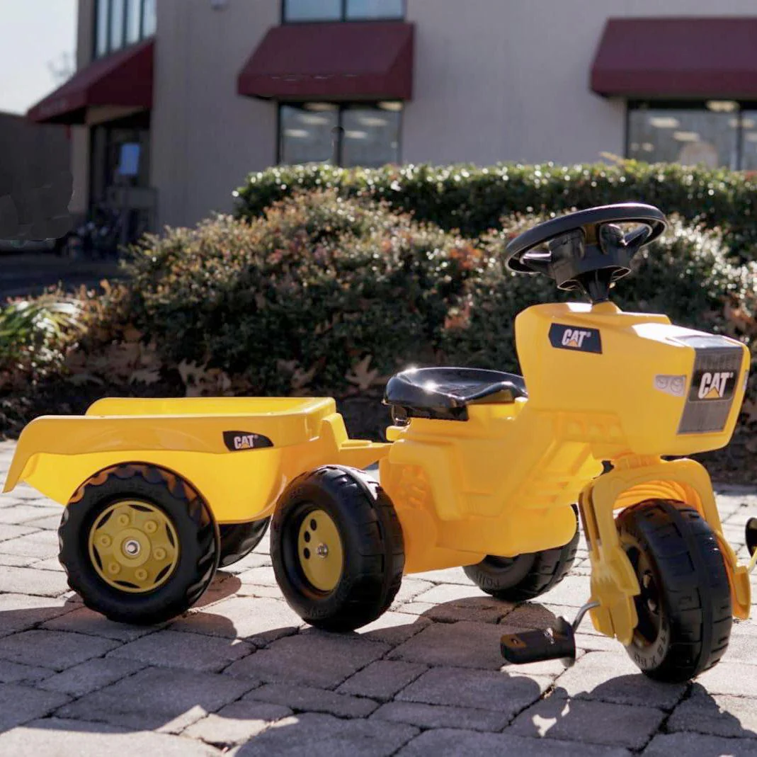 Cat® Trattore a Tre Ruote con Sedile