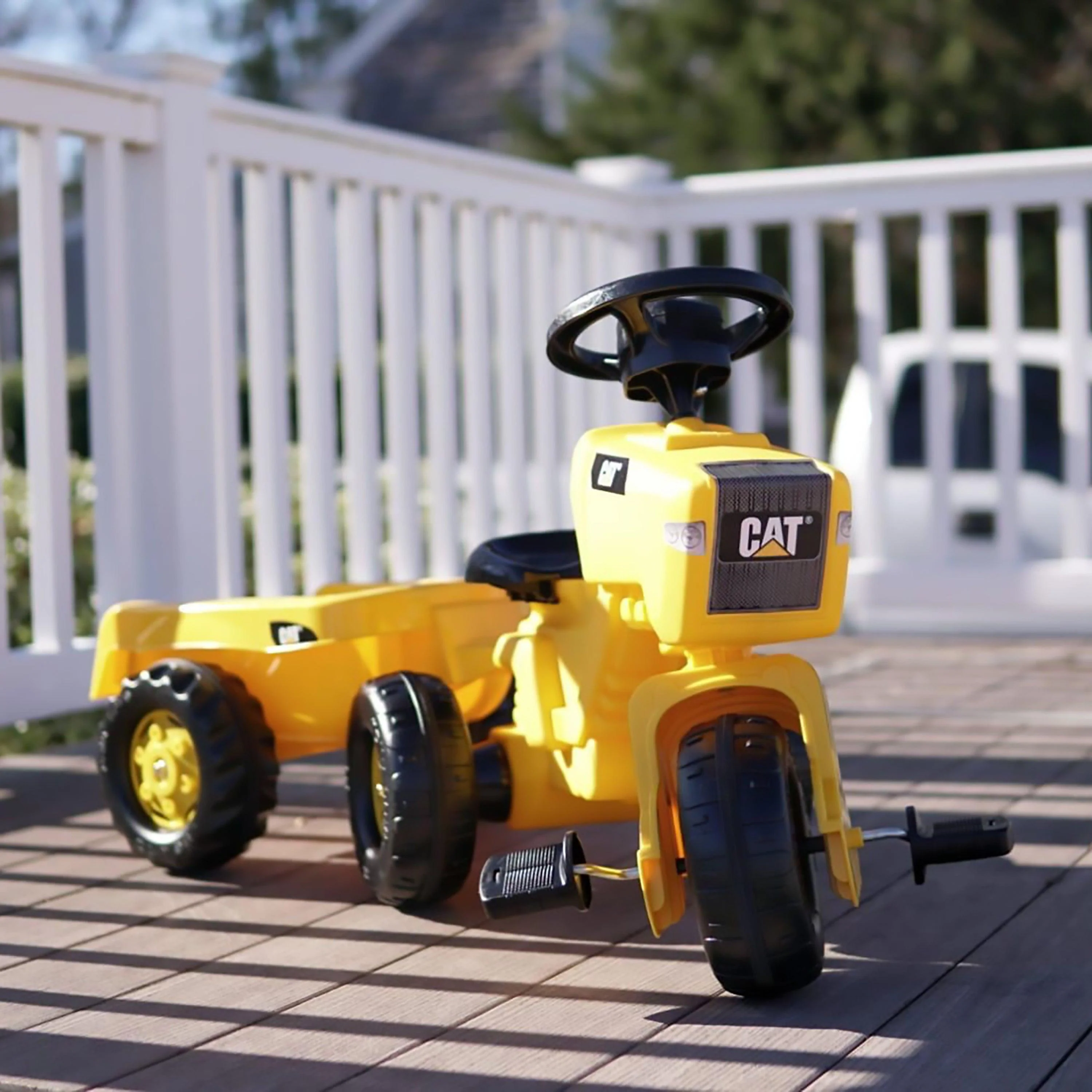 Cat® Trattore a Tre Ruote con Sedile